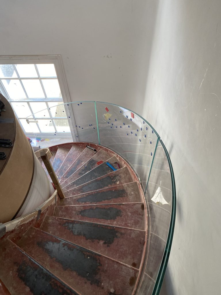 Curved glass staircase balustrade in London